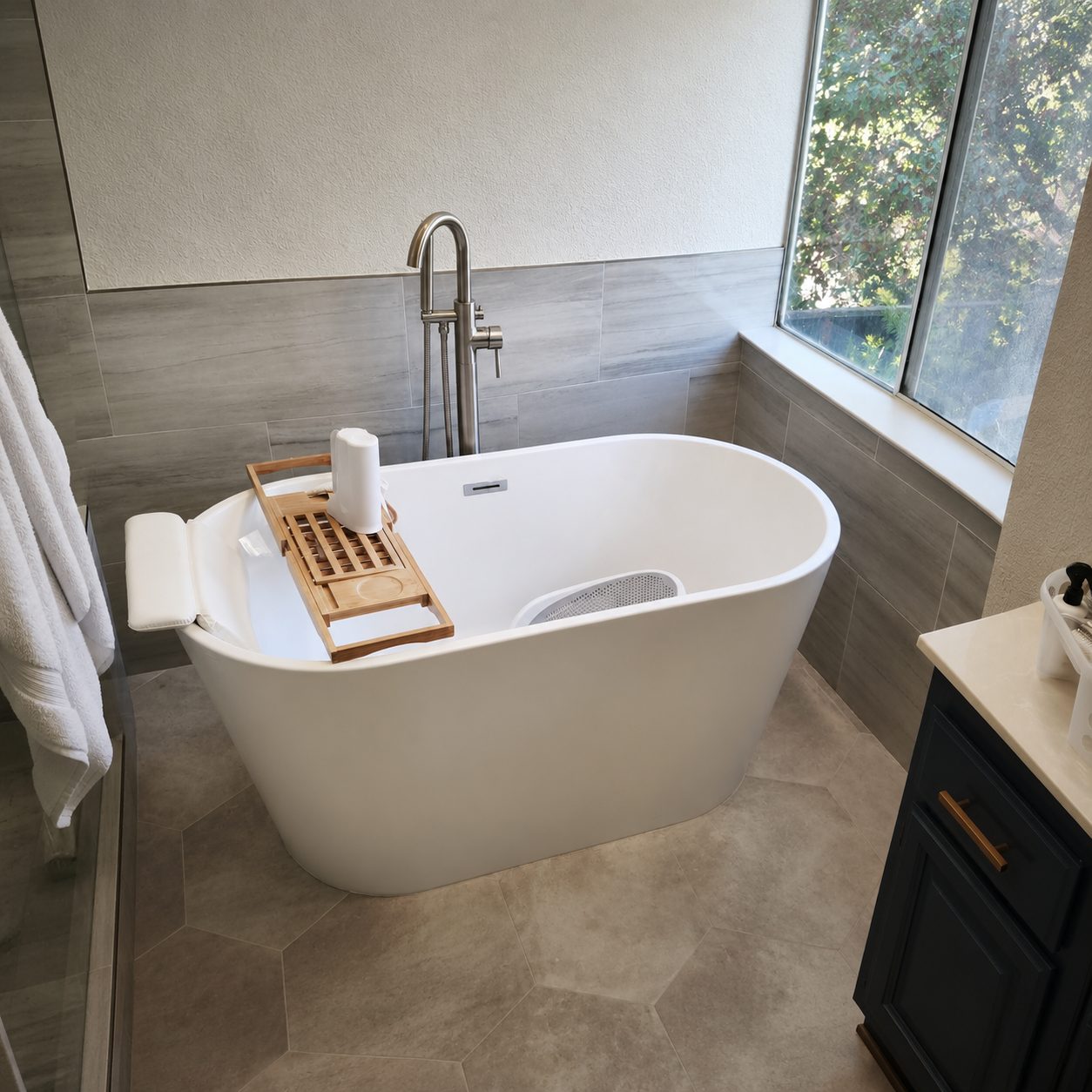 Remodeled bathroom with freestanding tub